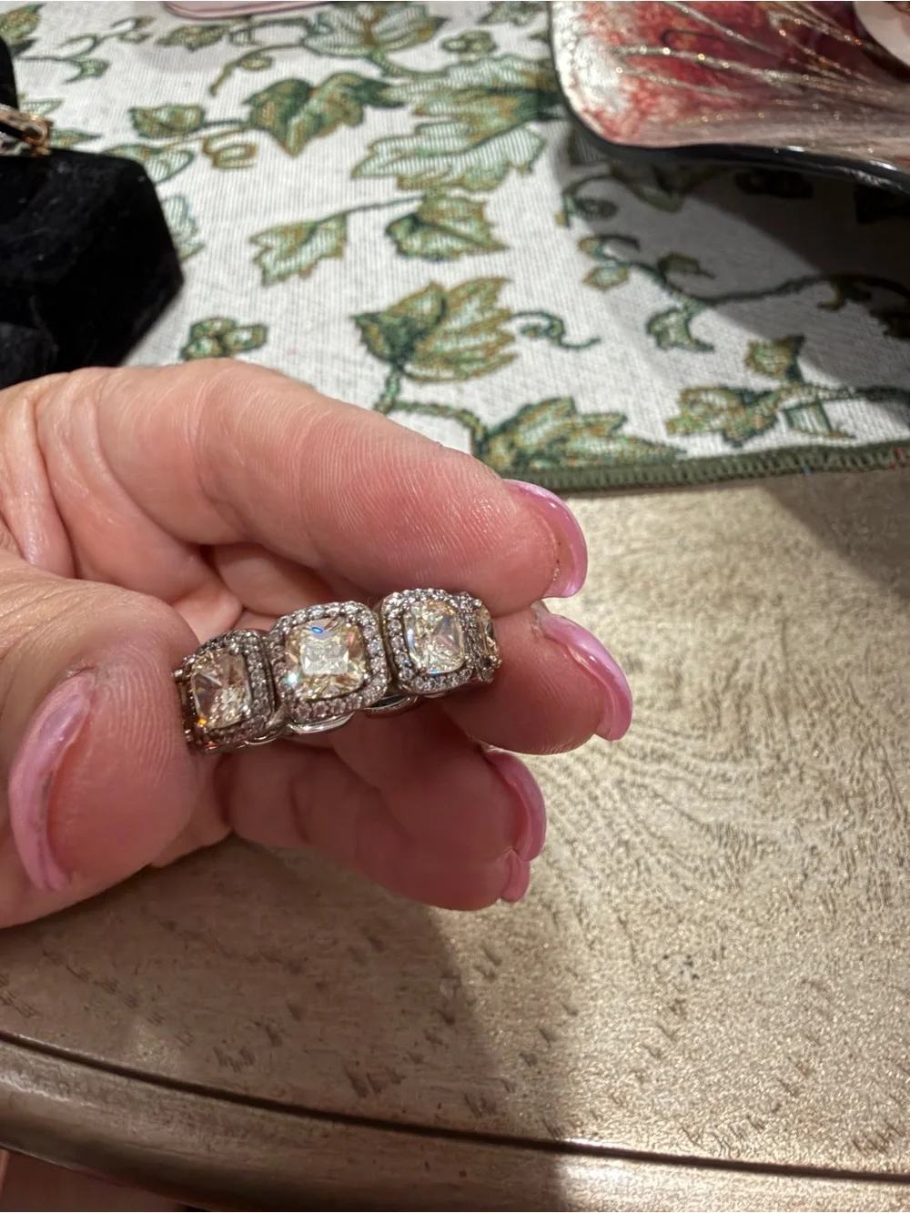 Elegant Yellow-Gold Halo Ring with Clear Accent Stones